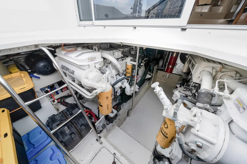 Slide: The Image of Engine room of 2001 Cruisers Yachts 5000 Sedan Sport with Caterpillar engines. - 21
