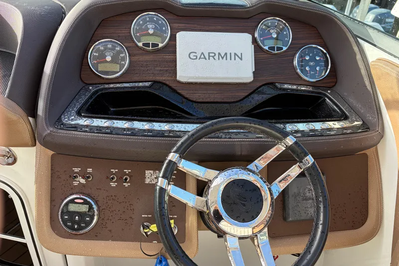 Slide: The Image of Dashboard of a 2015 Cobalt 336 boat with Garmin navigation system. - 21