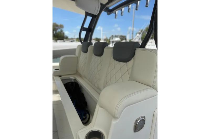 Slide: The Image of Luxurious seating on 2017 HCB 53 Suenos boat with diamond-stitched upholstery. - 17