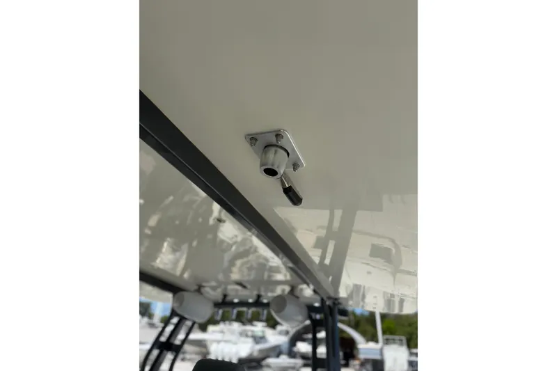 Slide: The Image of Close-up of a 2017 HCB 53 Suenos boat's ceiling fixture and structure. - 22