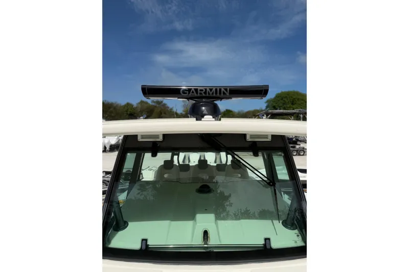 Slide: The Image of 2017 HCB 53 Suenos boat with Garmin radar against blue sky. - 24