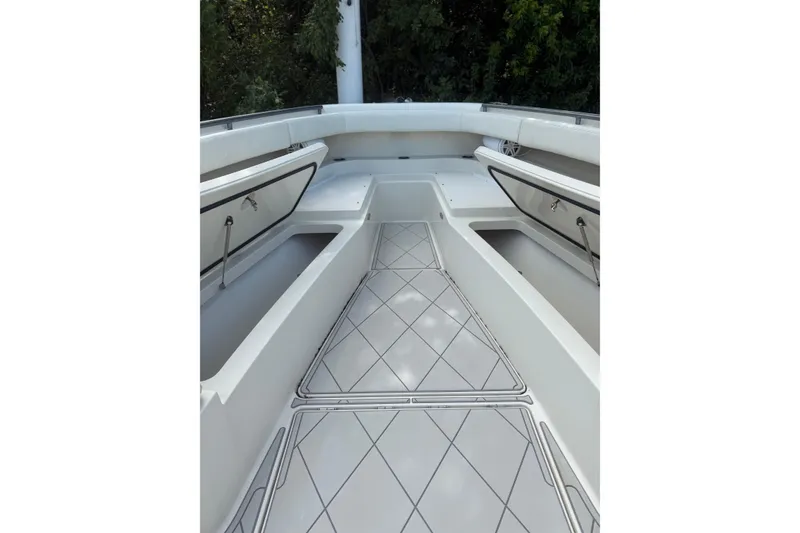 Slide: The Image of Interior view of 2017 HCB 53 Suenos boat, featuring spacious storage compartments. - 27