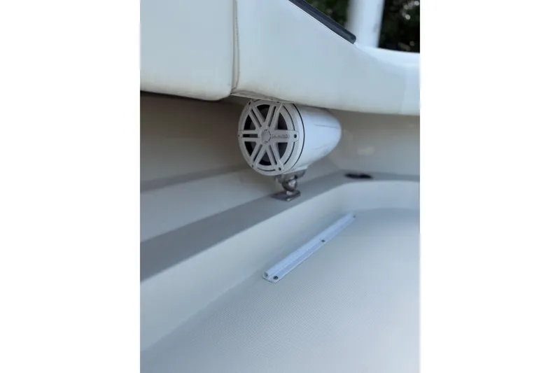 Slide: The Image of Speaker system on a 2017 HCB 53 Suenos boat, featuring sleek white design. - 29