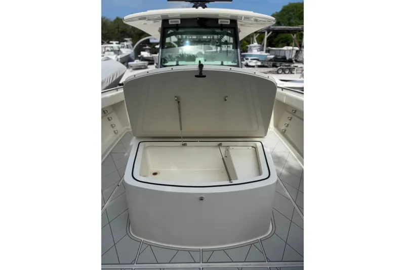 Slide: The Image of Open storage compartment on 2017 HCB 53 Suenos boat deck. - 32