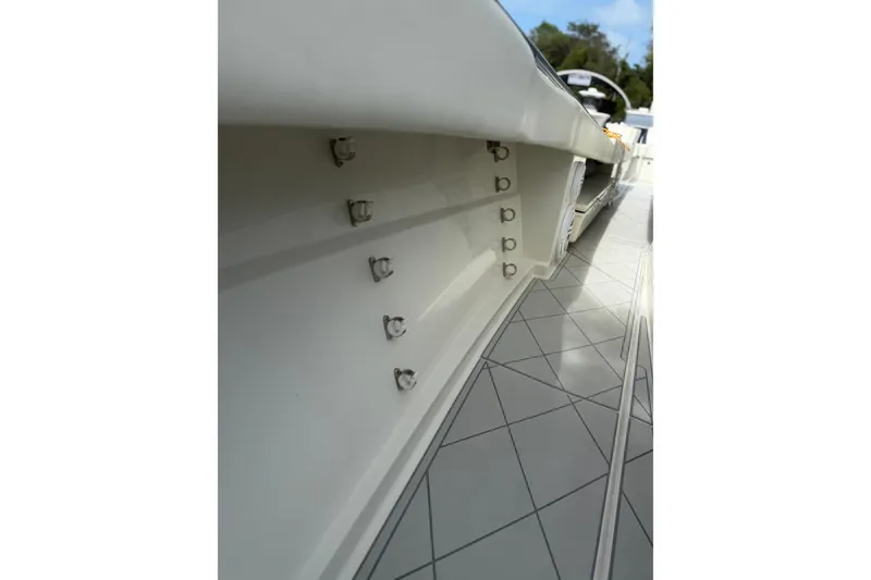 Slide: The Image of 2017 HCB 53 Suenos boat interior with sleek white design and metal fixtures. - 35