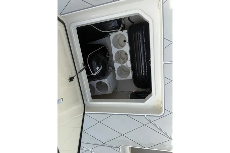 Slide: The Image of Storage compartment of 2017 HCB 53 Suenos boat, featuring organized interior space. - 37