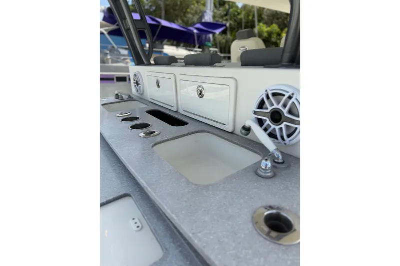 Slide: The Image of Interior view of 2017 HCB 53 Suenos boat featuring storage compartments and speakers. - 42