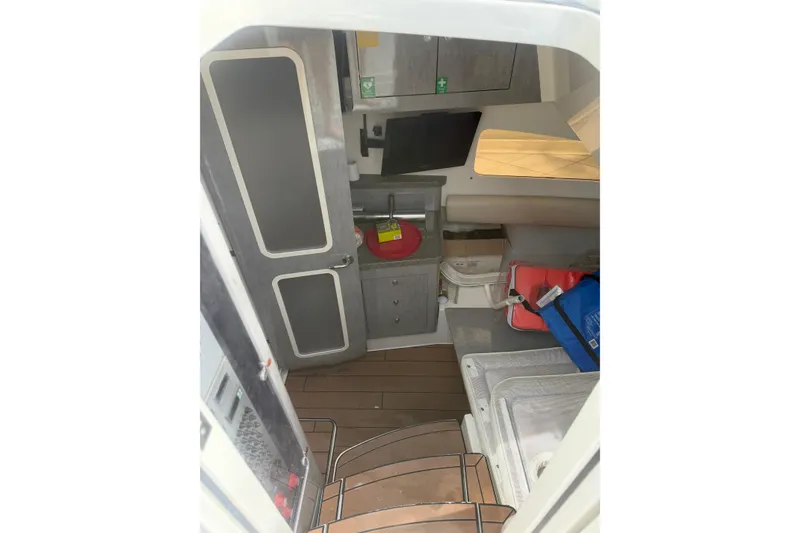 Slide: The Image of Interior cabin of 2017 HCB 53 Suenos boat with storage and seating area. - 45