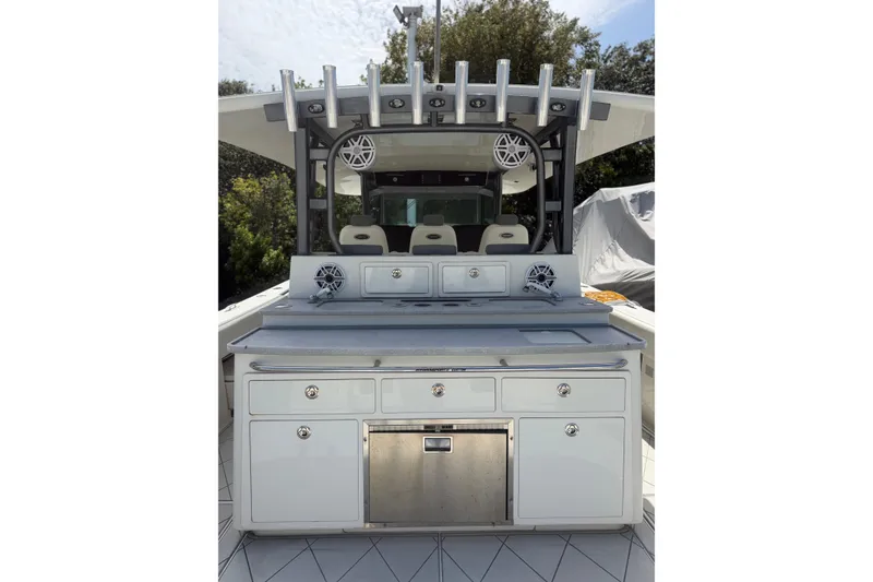 Slide: The Image of 2017 HCB 53 Suenos boat interior with seating and storage compartments. - 8