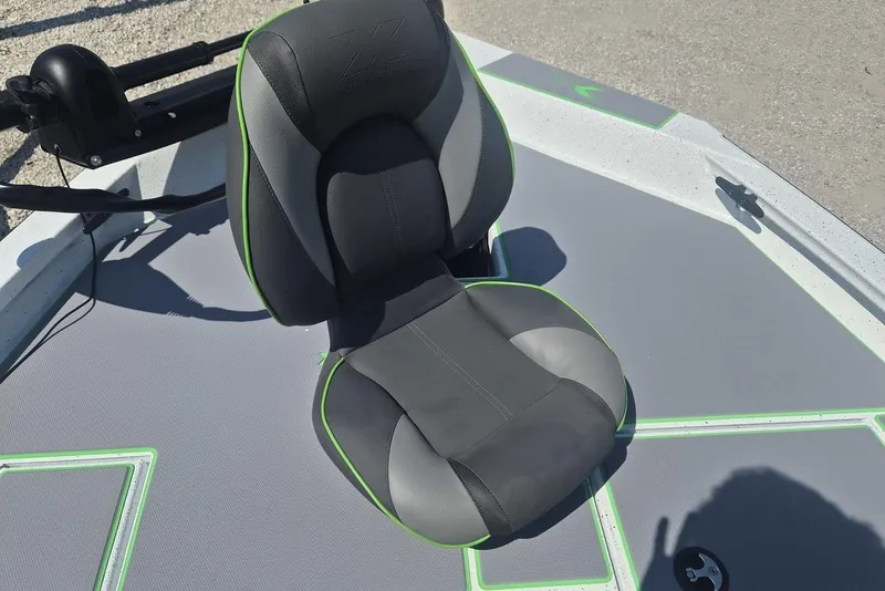 Slide: The Image of Comfortable seat on 2026 Xpress H18 boat deck, featuring sleek design and green accents. - 9