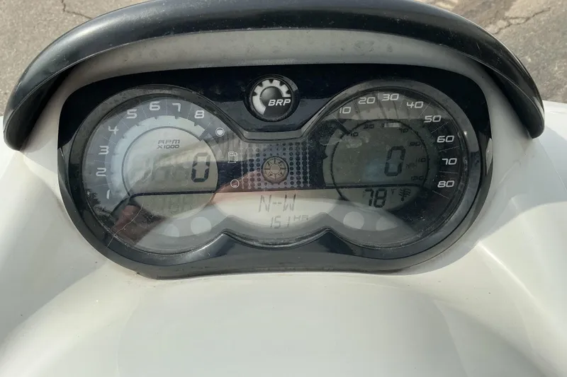 Slide: The Image of Dashboard of a 2007 Sea-Doo RXT 215 showing speedometer and RPM gauges. - 6