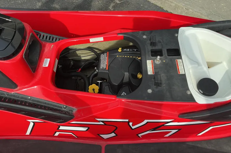 Slide: The Image of Red 2007 Sea-Doo RXT 215 jet ski engine compartment, showcasing internal components. - 8