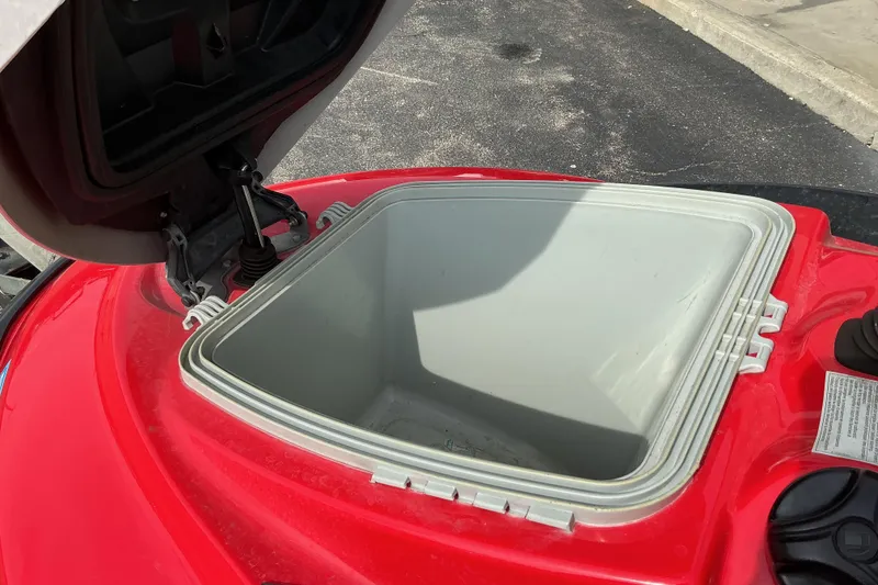 Slide: The Image of Open storage compartment of a 2007 Sea-Doo RXT 215 watercraft. - 9