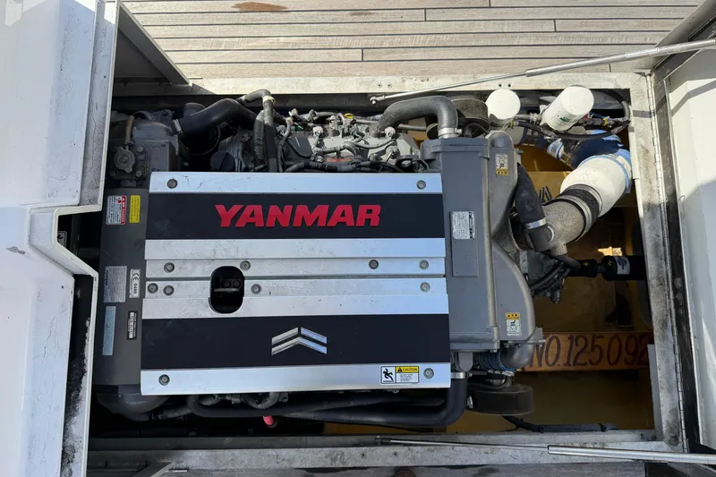 Slide: The Image of Yanmar engine in a 2013 Custom Jet Center Console boat, viewed from above. - 28