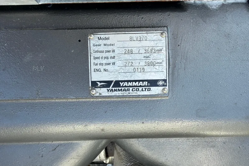 Slide: The Image of Yanmar engine plate on Custom Jet Center Console, model 8LV370, year 2013. - 30
