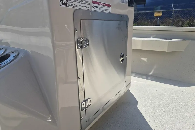Slide: The Image of Stainless steel compartment door on 2026 Xpress H24B Bay boat. - 8