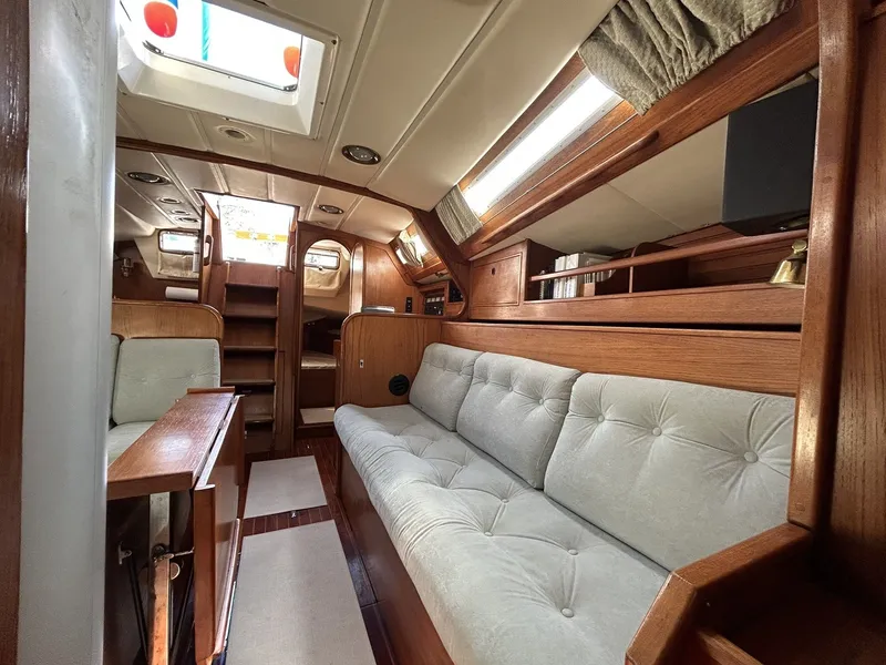 The Image of Interior of a 1987 Wauquiez Centurion yacht with wooden furnishings. - 10