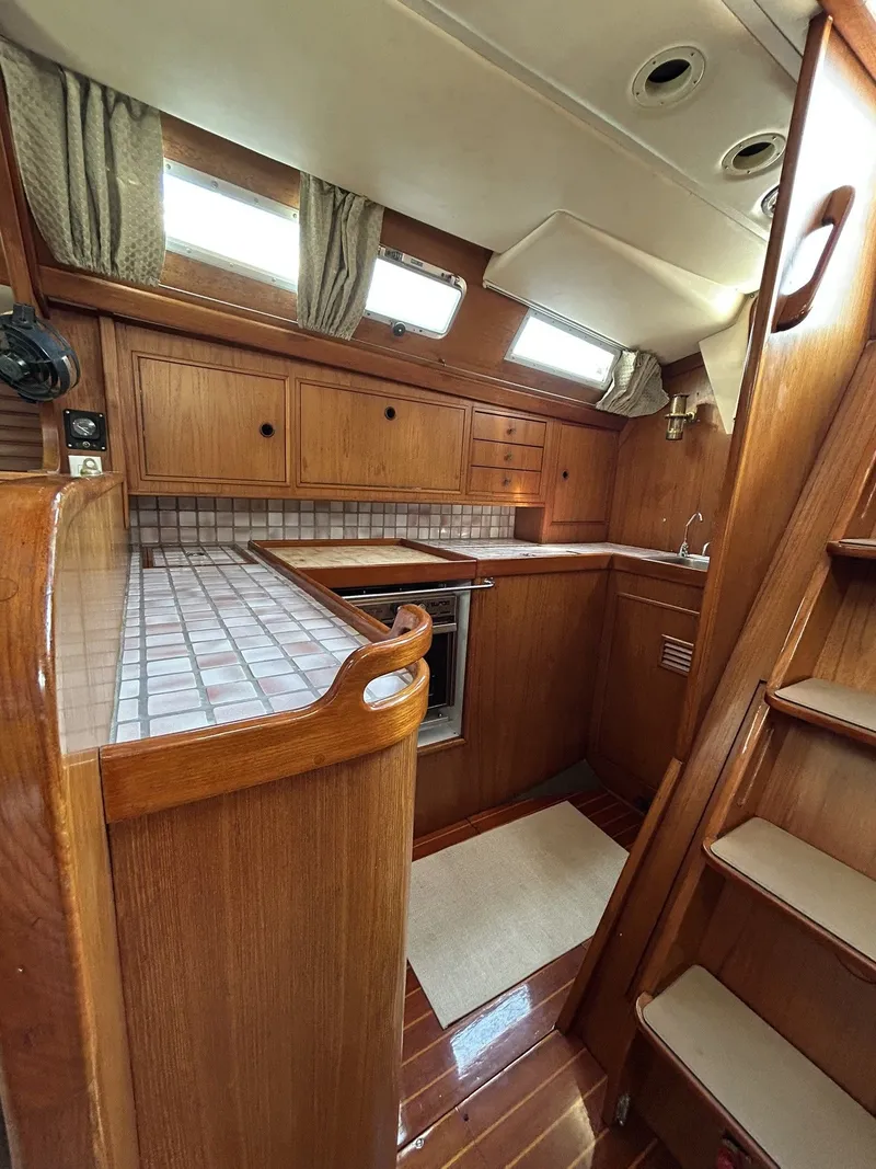 Slide: The Image of Interior view of a 1987 Wauquiez Centurion yacht kitchen. - 14