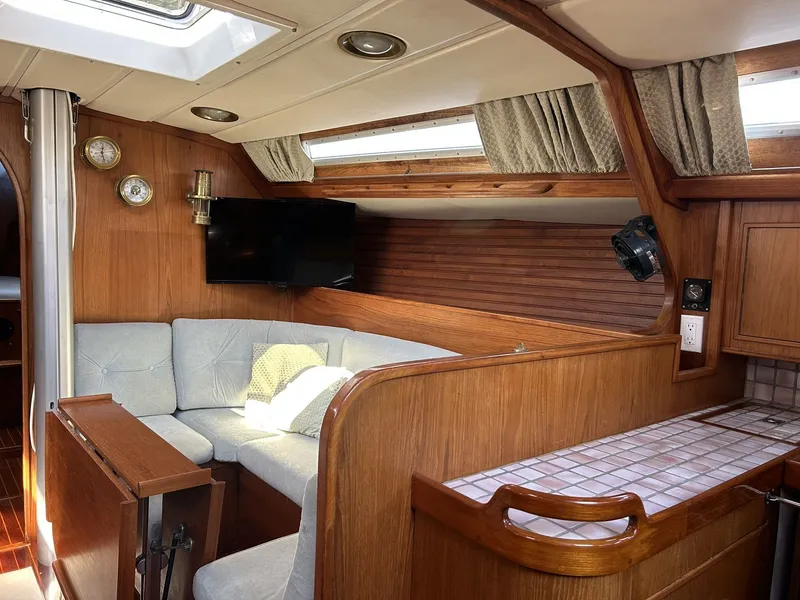 Slide: The Image of Interior of a 1987 Wauquiez Centurion yacht with wood finish. - 17