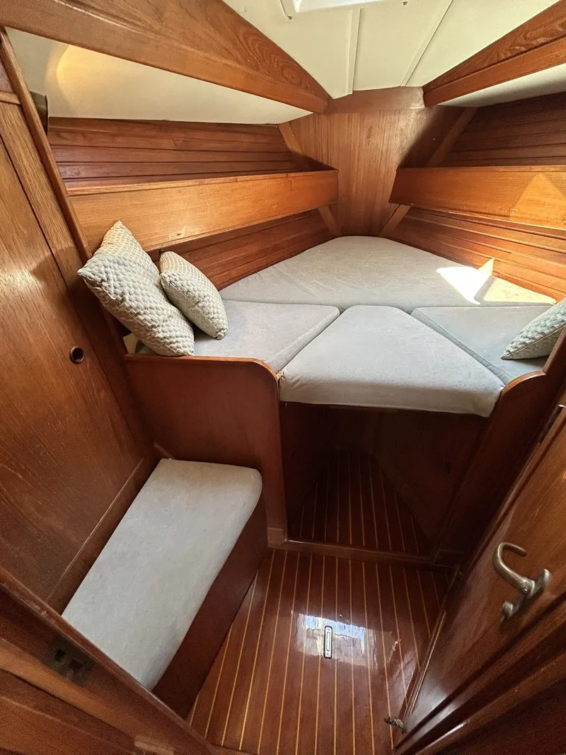 Slide: The Image of Interior of a 1987 Wauquiez Centurion yacht with wooden finish. - 33