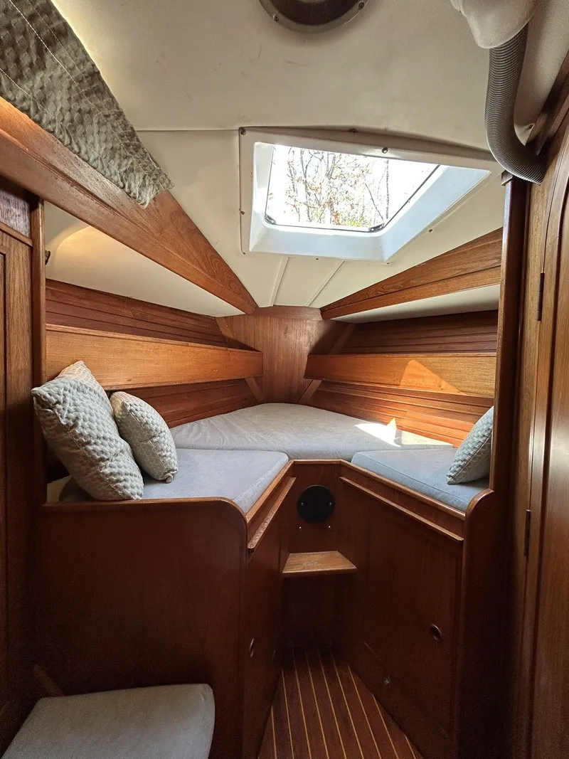 Slide: The Image of Interior of a 1987 Wauquiez Centurion yacht with wooden finish. - 34