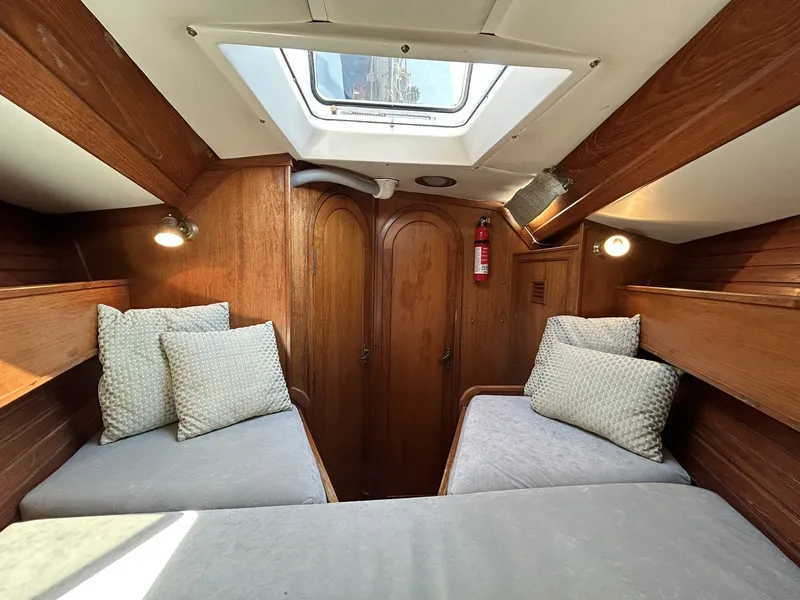 Slide: The Image of Interior of a 1987 Wauquiez Centurion yacht with wooden finish. - 36