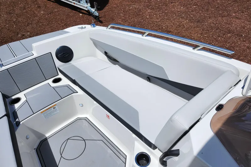 Slide: The Image of 2026 Starcraft SV 18 OB boat interior with cushioned seating and cup holders. - 10