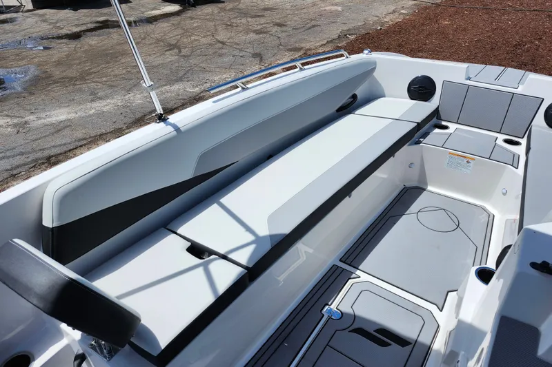 Slide: The Image of Interior view of 2026 Starcraft SV 18 OB boat, featuring sleek seating and modern design. - 11