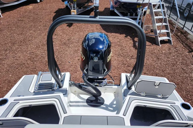 Slide: The Image of 2026 Starcraft SV 18 OB boat with outboard motor and swim platform. - 17