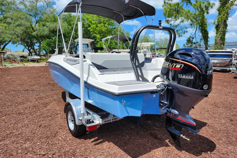 Slide: The Image of 2026 Starcraft SV 18 OB boat with Yamaha engine on a trailer, outdoors. - 4