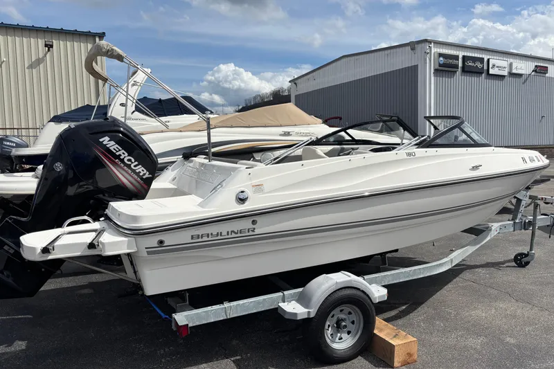 Slide: The Image of 2018 Bayliner 180 Bowrider boat on trailer with Mercury outboard motor. - 6