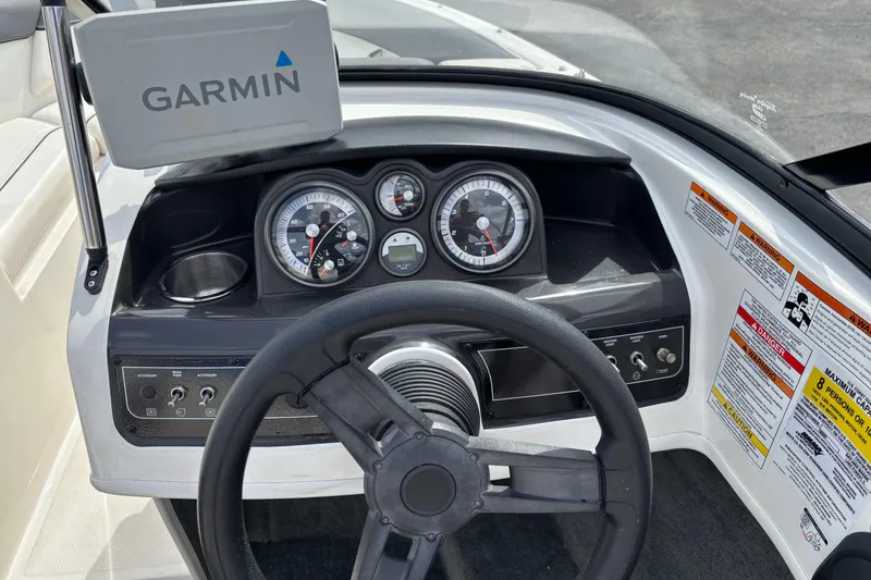 Slide: The Image of 2018 Bayliner 180 Bowrider dashboard with Garmin GPS and instrument panel. - 9