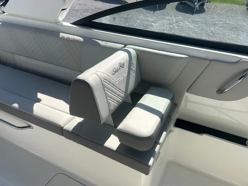 Slide: The Image of The image shows a bench seat on a Sea Ray 270SD-OB boat, featuring quilted upholstery. - 11