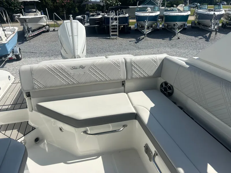 Slide: The Image of The image shows the cockpit of a Sea Ray 270SD-OB boat with comfortable seating. - 9