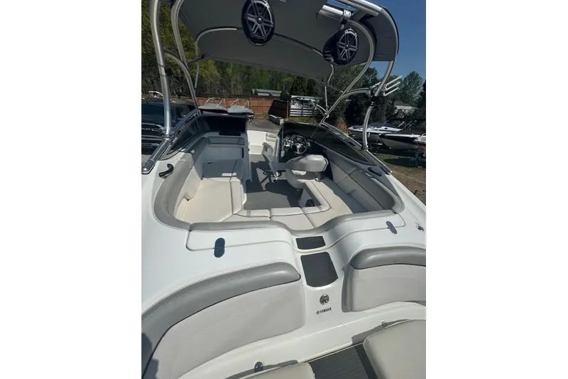 Slide: The Image of 2012 Yamaha AR210 boat interior with seating and speakers, showcasing sleek design. - 4