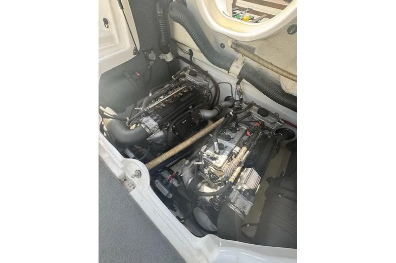 Slide: The Image of 2012 Yamaha AR210 engine compartment with dual engines and visible components. - 5