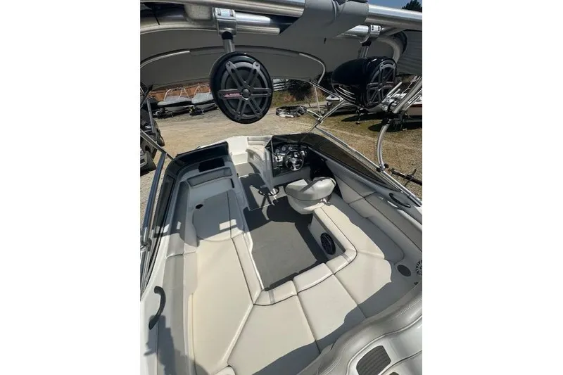 Slide: The Image of 2012 Yamaha AR210 boat interior with seating and speakers. - 6