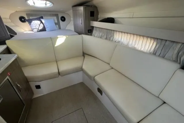 Slide: The Image of Interior of 2020 Regal 33 XO yacht with cozy seating and modern design. - 5