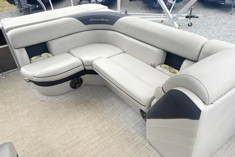 Slide: The Image of Luxurious 2022 South Bay LE boat seating with cup holders and premium upholstery. - 6