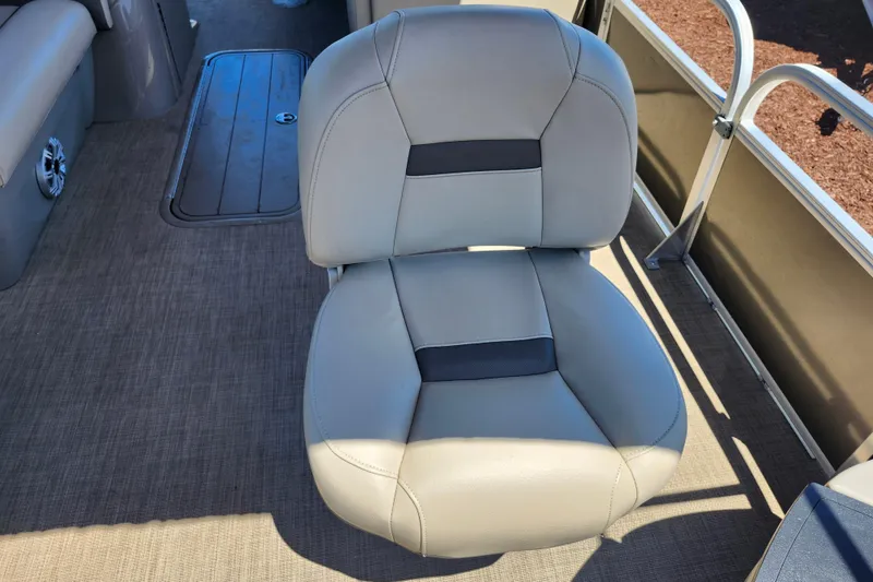 Slide: The Image of 2023 Sun Tracker Fishin' Barge 22 XP3 boat seat, beige upholstery, interior view. - 24