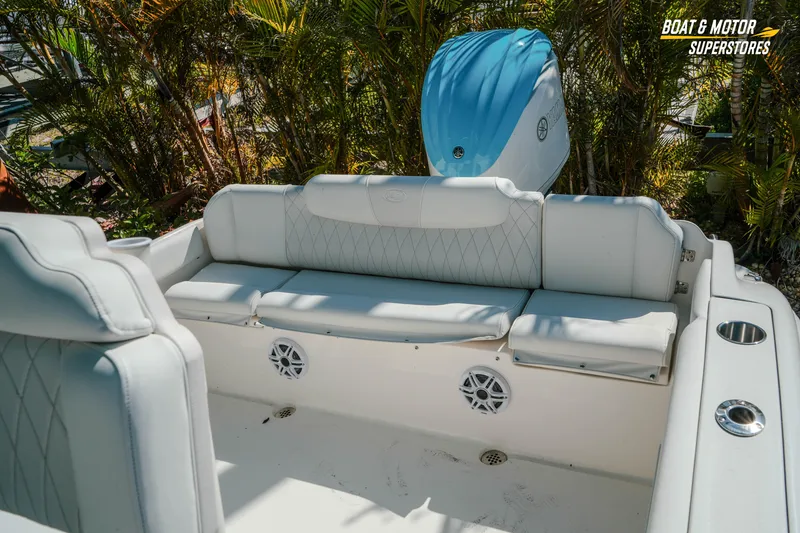 Slide: The Image of Luxurious seating on 2026 Key West 239 FS boat, featuring white upholstery and modern design. - 23