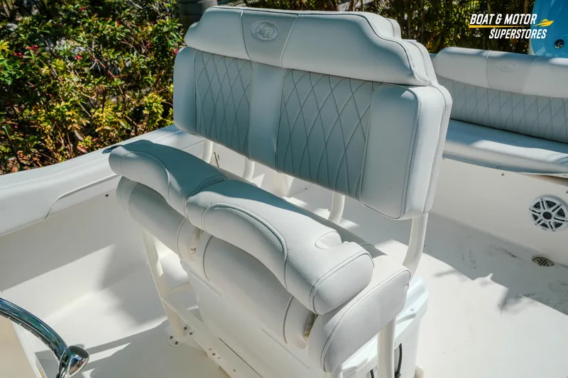 Slide: The Image of 2026 Key West 239 FS boat interior with luxurious white seating and elegant design. - 24