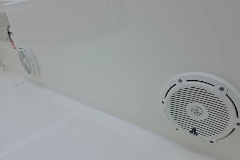 Slide: The Image of 2026 Boston Whaler 190 Montauk boat speakers, white interior detail. - 13