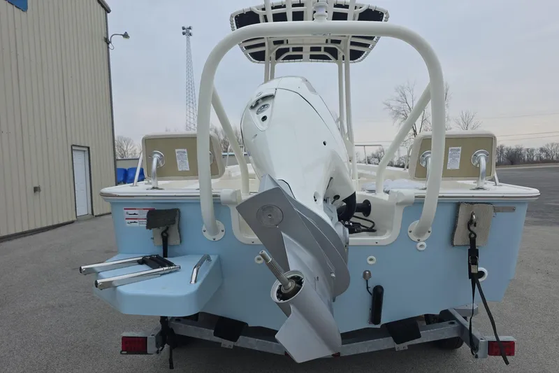 Slide: The Image of 2026 Boston Whaler 190 Montauk boat rear view with outboard motor. - 5