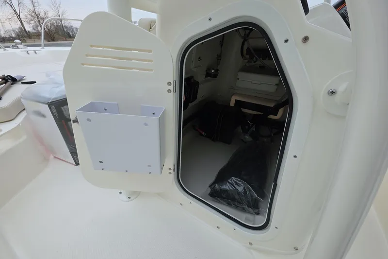 Slide: The Image of Open storage compartment on 2026 Boston Whaler 190 Montauk boat. - 9