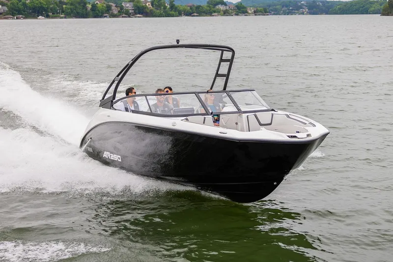 Slide: The Image of Manufacturer Provided Image: 2026 Yamaha Boats AR250 cruising on a lake with passengers enjoying the ride. - 4