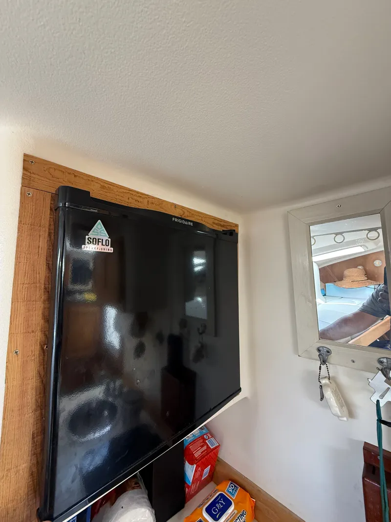 Slide: The Image of Fridge inside Luhrs Tournament 290 Open boat, year 2000. - 12