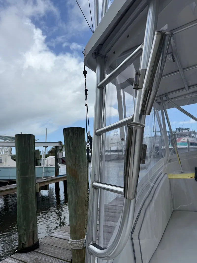 Slide: The Image of Luhrs Tournament 290 Open 2000 at dock with ladder and sky. - 18