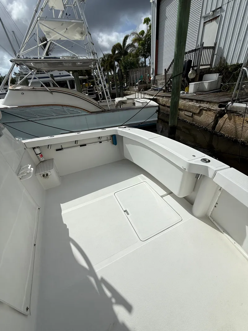 Slide: The Image of Luhrs Tournament 290 Open 2000, spacious deck, docked at marina. - 19