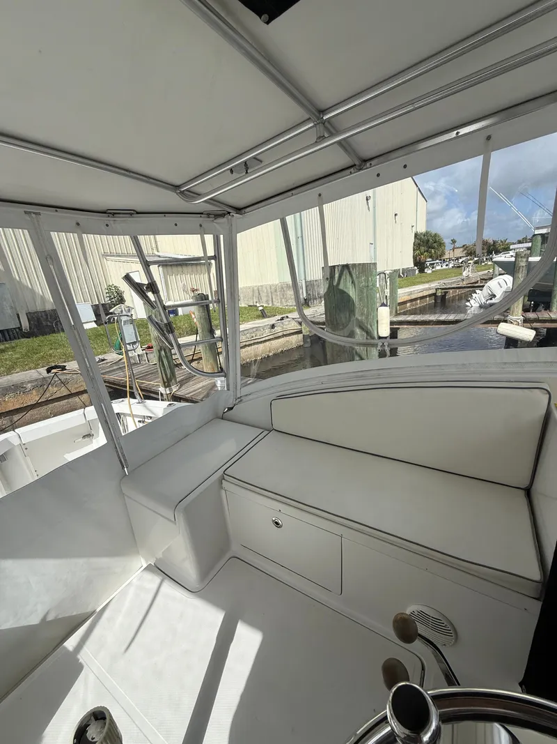 Slide: The Image of Interior of 2000 Luhrs Tournament 290 Open with white seating area. - 6